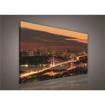 Obraz Obraz na plátně Východ slunce nad městem 100 x 75 cm