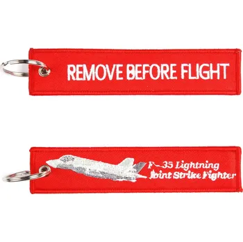 Přívěsek na klíče Fostex Remove before flight F-35 Lightning 2 - červený