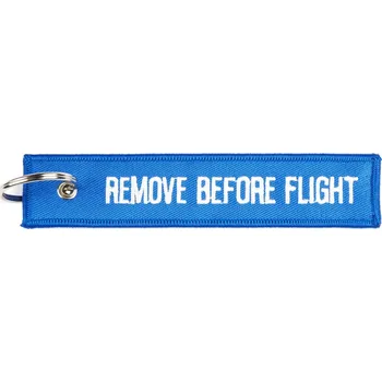 Přívěsek na klíče Fostex Remove before flight - modrý