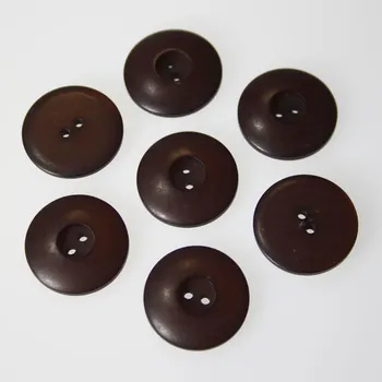Knoflík Knoflík hnědý K32-8, průměr 20 mm.