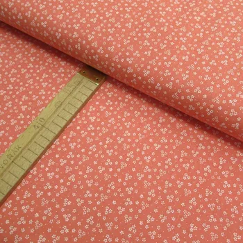 Bavlněné plátno - Květy bílé na korálové - šíře 150cm