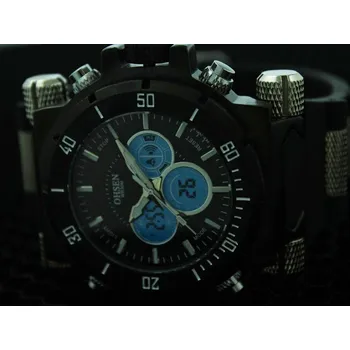 Hodinky Hodinky army Ohsen (Hodinky Ohsen se pyšní robustním ciferníkem, který na Vaší ruce zaručeně nikdo nepřehlédne. Analogový čas doplňují tři funkční malé ciferníky, které zobrazují čas, datum, den, stopky, alarm.)