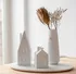 Svícen Glassor Porcelánový svícen domeček komínem 20 cm