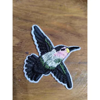 Textilní nažehlovací páska Nažehlovačka ptáček černozelený