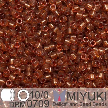 Korálek Korálky Miyuki Delica 10/0. Barva Transparent Dark Topaz DBM0709. Balení 5g.