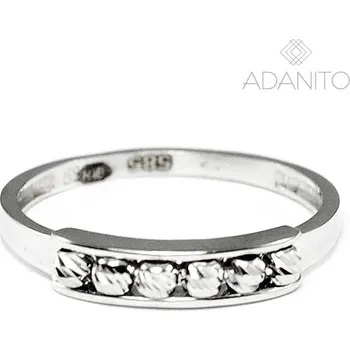 Prsten Zlatý prsten s broušenými kuličkami z bílého zlata