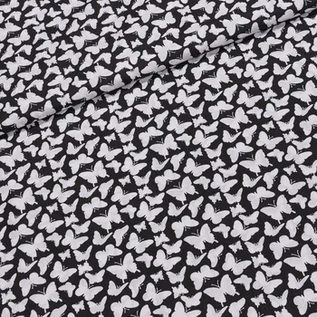 Bavlněné plátno ANIKA bílý motýlek na černé, š.160cm (látka v metráži)