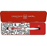 Caran d´Ache Caran d'Ache, NM0849.123, kuličkové pero Keith Haring v kovové kazetě, bílá, 1 ks