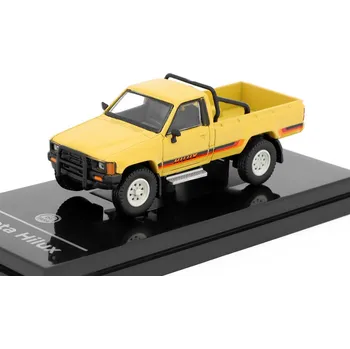 autíčko Toyota Hilux 1984 žlutá 1:64 - PARAGON Models Toyota Hilux Single Cab 1984 - kovový model auta