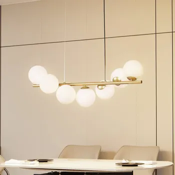 Závěsné svítidlo Lucande Isandro, 95 cm, zlatá, bílá, 7 světel, G9 - Ø jedné koule 15 cm zlatý mat, opál 7 x 8 W LED - Doprava zdarma