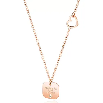 Náhrdelník Ocelový náhrdelník, měděná barva - tenký řetízek, známka s nápisem "Falling in love for real"