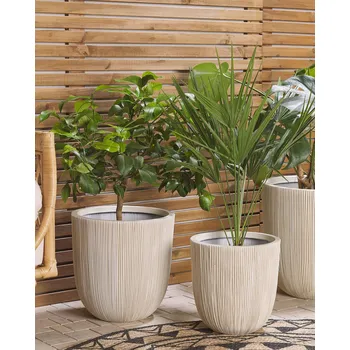 Květináč Květináč béžový polyresin kolem 44 cm v drážkovaném vzhledu Dekorace pro venkovní venkovní zahradu Beliani