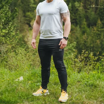 Černé pánské funkční tepláky s kapsami Velikost: L