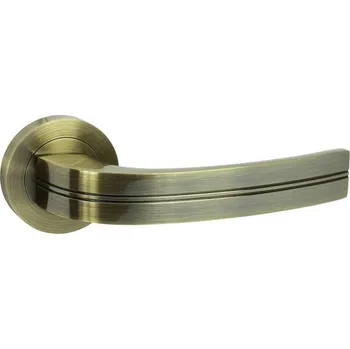 Dveřní kování Walteco Klika TUKAN, rozeta se zámkem BB, kulatá, broušená mosaz