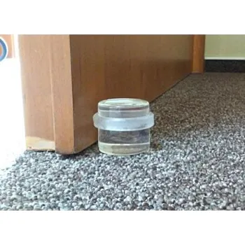 Vchodové dveře AMiG zarážka dveřní transparentní