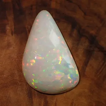 Přírodní kámen Drahý opál z Etiopie 26x17mm Váha: 12,08ct