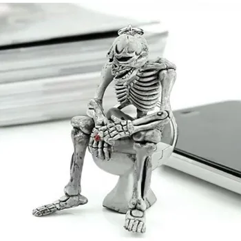 Klíčenka kostlivec na WC