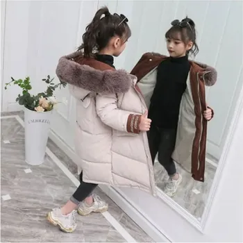 Velmi kvalitní dívčí zimní bunda s odepínací kožešinkou na kapuci Barva: slonovinová kost, Velikost: 130 (6-7 let)