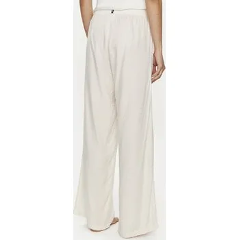 Dámské pyžamo Tommy Hilfiger Pyžamové kalhoty UW0UW05230 Écru Relaxed Fit S