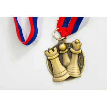 Šachy Šachová medaile figurky zlatá
