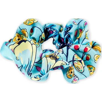 Pestrá gumička s potiskem motýlů Barva: modrá