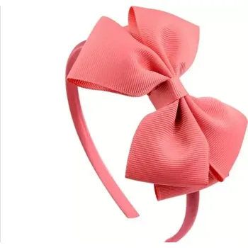 Dětská vlasová čelenka s mašličkou v oranžovo růžové barvě (Vlasové doplňky )