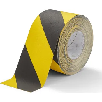Výstražná páska Černo-žlutá korundová snímatelná protiskluzová páska FLOMA Hazard Standard Removable - 18,3 m x 10 cm a tloušťka 0,7 mm