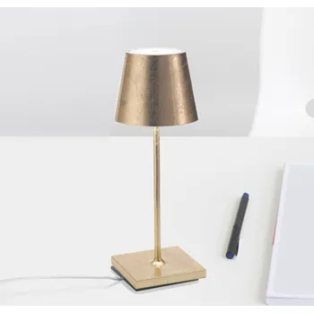 Venkovní osvětlení Zafferano Poldina mini stolní lampa na baterie, vnitřní část zlatá - Noha – délka 10 cm, šířka 10 cm, výška 1 cm, výška stínidla na lampu 8,8 cm zlato 1 x 2,2 W LED - Doprava zdarma