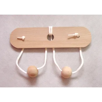 Hlavolam Dřevěný hlavolam prsa