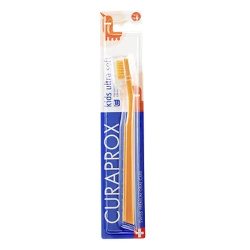 Zubní kartáček Curaprox CS Kids dětský zubní kartáček 4-12 let blistr barva: Oranžový