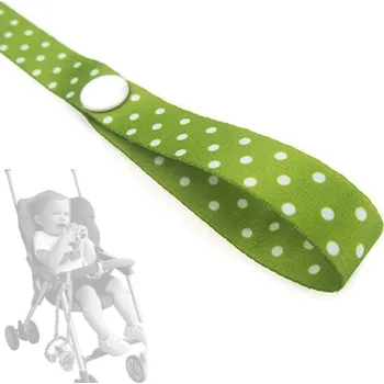 Popruh proti padání hraček z kočárku TopQ Zelený s puntíky