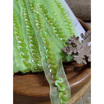 Flitrový prýmek na monofilu šíře 27 mm barva zelinkavá