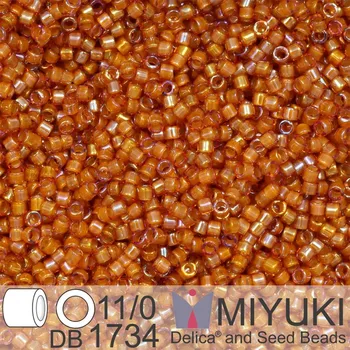 Korálek Korálky Miyuki Delica 11/0. Barva Beige Lined Topaz AB DB1734. Balení 5g.