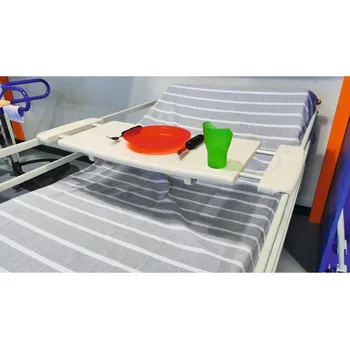 Stůl na zábrany postele