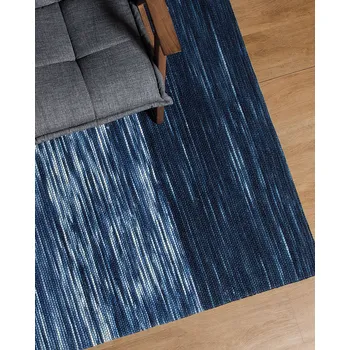 Koberec koberec Modrý vlněný 140 x 200 cm, krátkosrstý, ručně tkaný Beliani