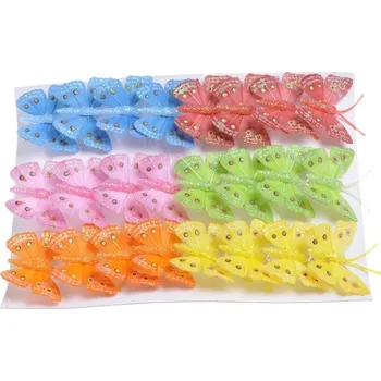 Barevný Motýl na klipu - žlutá