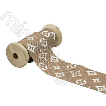 Stuha Stuha bílé ornamenty béžová 40 mm