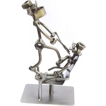 Kovová figurka - Zubař trhací 23 cm