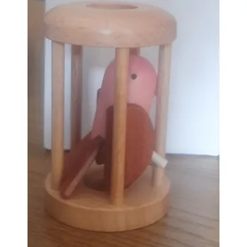 Hlavolam Pták v kleci růžové tělo hnědá křídla