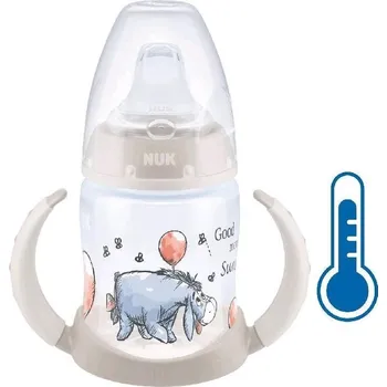 Kojenecká láhev Kojenecká láhev na učení NUK Medvídek Pú s kontrolou teploty 150 ml béžová oslík