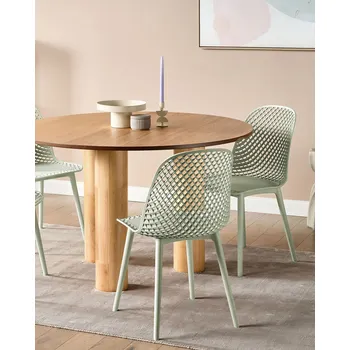 Jídelní židle Sada 4 jídelních židlí světle zelený syntetický sedák a nohy otevřená síťovaná opěradla moderní minimalistický styl Beliani