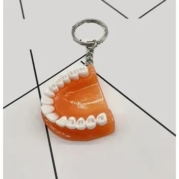Přívěsek na klíče zuby