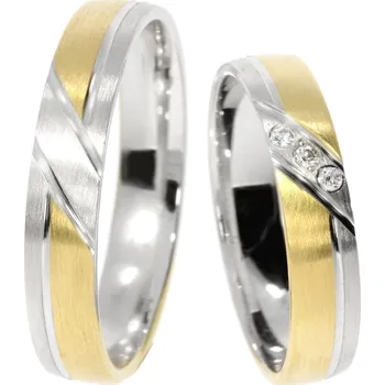 Prsten Zlatnictví Helios Zlaté snubní prsteny HR-141 Kameny: Se Zirkony