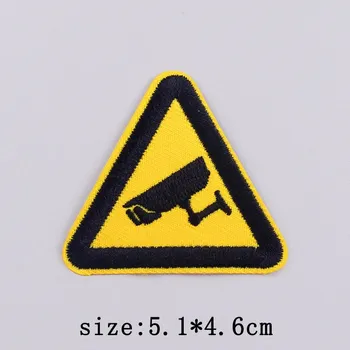 Nášivka Nášivka nažehlovací symbol Pozor kamera 5,1 x 4,6 cm - žlutá