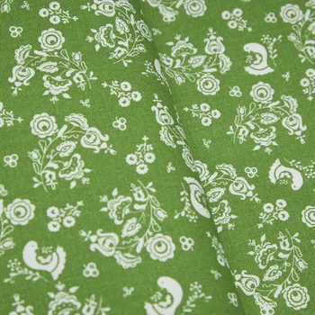 Tegatex Folklorní látka metráž -bílé květy na zelené