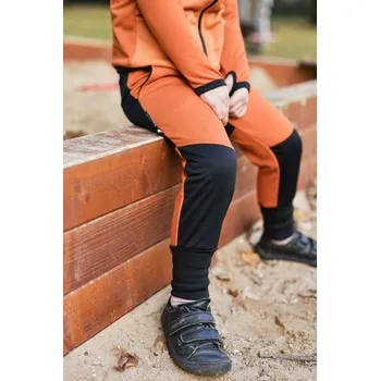 Kojenecké oblečení oranžové tecnostretchovo-softshellové rostoucí tepláčky