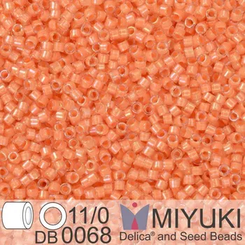 Korálek Korálky Miyuki Delica 11/0. Barva Peach Lined Crystal Luster DB0068. Balení 5g.