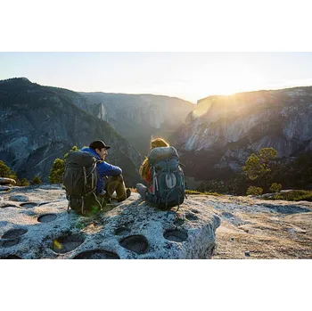 Plakát Plakát, Obraz - A couple backpacking in the mountains., Jordan Siemens