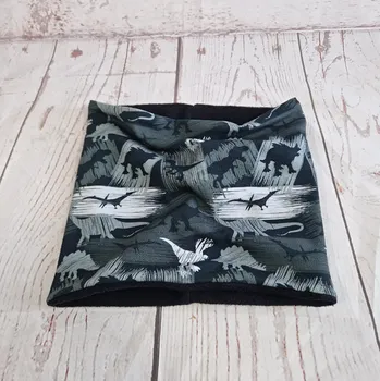 Nákrčník Yháček, Dinosauři na šedé