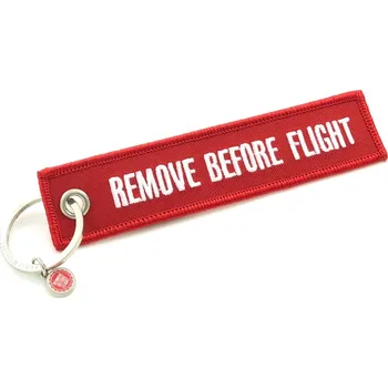 Klíčenka REMOVE BEFORE FLIGHT bílo/červená